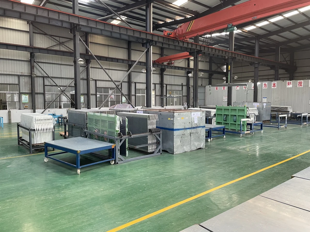 Ion membrane electrolyzer cell production workshop with assembly tables